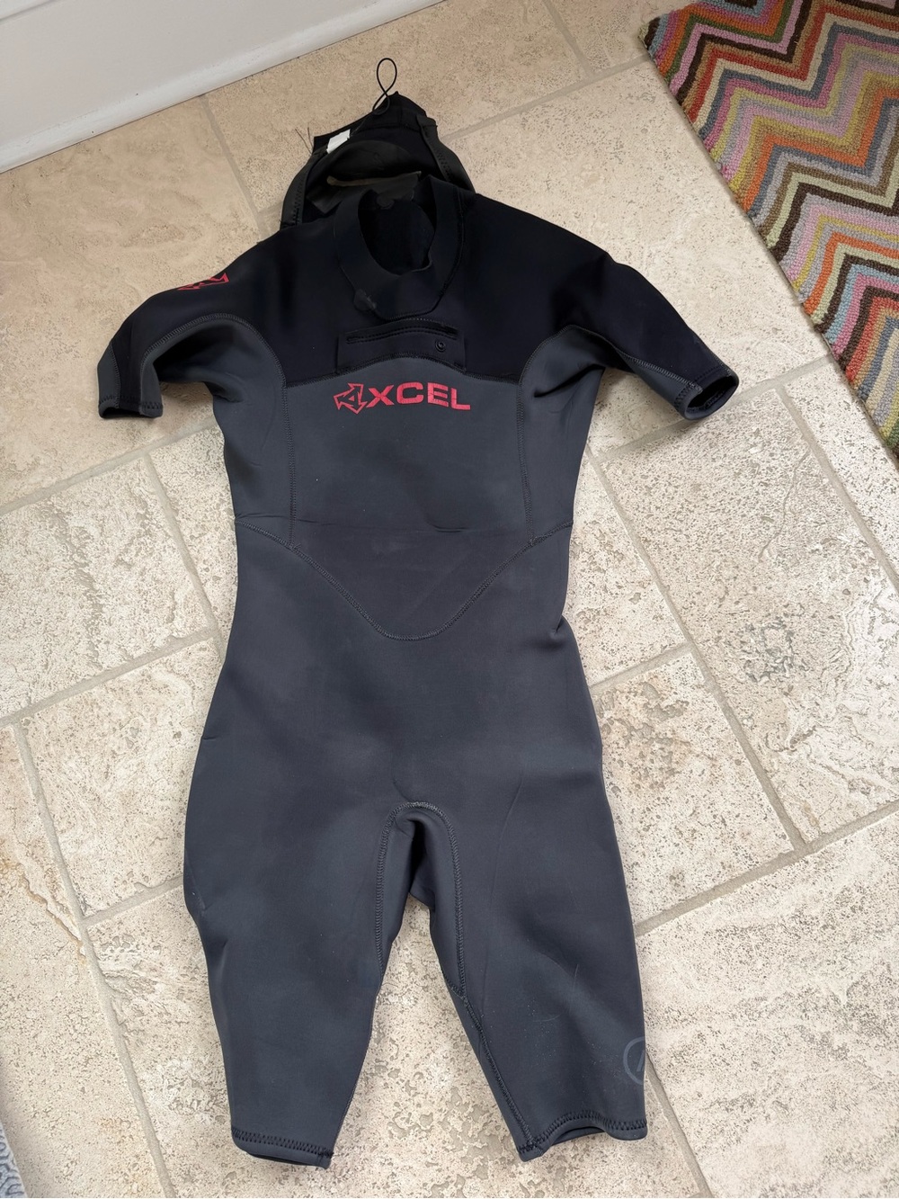 XCEL Short Sleeve Full Suit Wetsuit in Black with red Logo